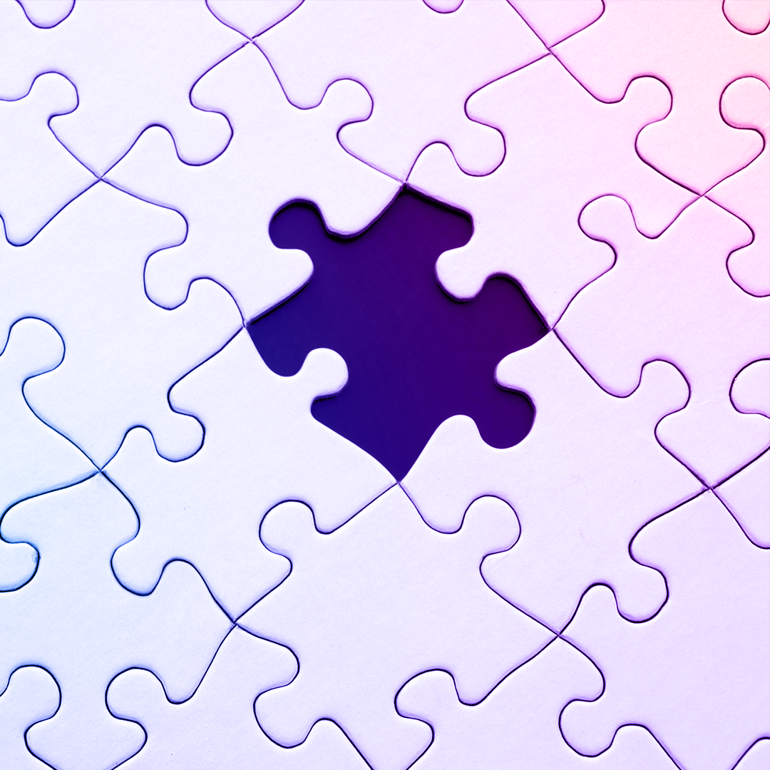 A nearly completed jigsaw puzzle with one piece missing in the center, displayed against a gradient background. OCIDM,io Branding and Digital marketing Hamilton, Toronto, Oakville, Mississauga